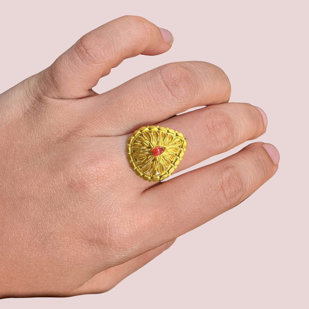 Golden Teardrop Ring with Red Accent