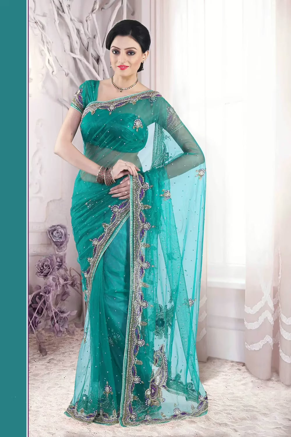 Pazaar Pine Green embroidered party saree with zari thread